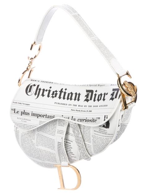 dior newspaper saddle bag.